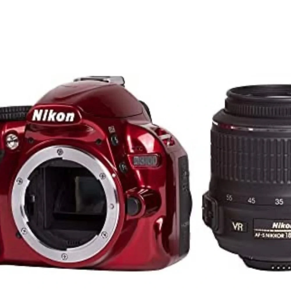 Nikon D3100 new camera has 2 batteries charger extra lens and carrying case